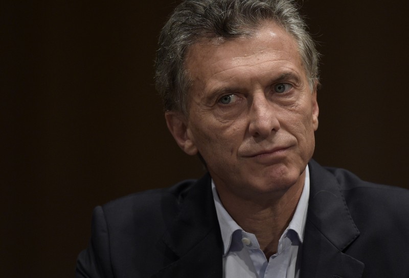  Argentina's president elect Mauricio Macri gestures during a press conference in Buenos Aires on November 23, 2015 the day after winning the run-off election against the ruling 