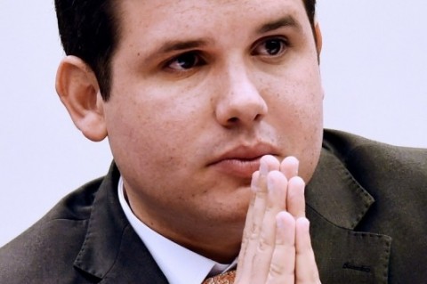  DEPUTY HUGO MOTTA FROM THE BRAZILIAN DEMOCRATIC MOVEMENT PARTY (PMDB) AND PRESIDENT OF THE PARLIAMENTARY COMMISSION OF INQUIRY IN THE CHAMBER OF DEPUTIES THAT INVESTIGATE ALLEGATIONS OF CORRUPTION AT PETROBRAS, SPEAKS IN BRASILIA ON MARCH 5, 2015.  DOZENS OF POLITICIANS FROM THREE PARTIES, INCLUDING FROM THAT OF BRAZILIAN PRESIDENT DILMA ROUSSEFF, HAVE BEEN IMPLICATED IN A CORRUPT NETWORK WHICH LAUNDERED $4 BILLION OF BRAZIL'S STATE OIL GIANT MONEY. AFP PHOTO/EVARISTO SA  