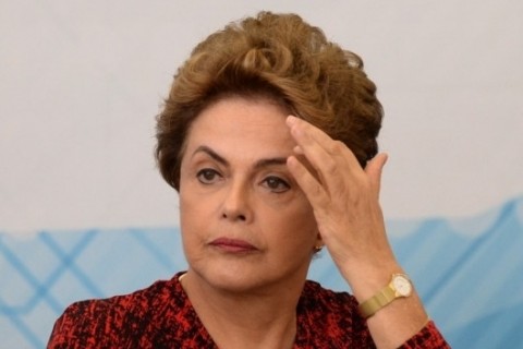  Brazilian President Dilma Rousseff attends the ceremony for the sanction of the legal framework for science, technology and innovation, in Brasilia, on January 11, 2016. Rousseff is under pressure over a badly faltering economy and political instability after impeachment proceedings were launched against her following a billion-dollar corruption scandal.  AFP PHOTO / ANDRESSA ANHOLETE  