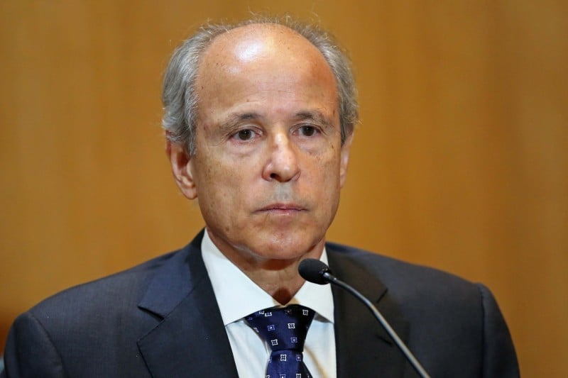  THE OWNER OF CONSTRUCTION COMPANY ANDRADE GUTIERREZ, OTAVIO MARQUES DE AZEVEDO, GESTURES DURING A HEARING OF THE PARLIAMENTARY COMMITTEE OF THE PETROBRAS INVESTIGATION IN THE FEDERAL JUSTICE COURT, IN CURITIBA ON AUGUST 31, 2015. OTAVIO MARQUES DE AZEVEDO IS ACCUSED OF CORRUPTION, MONEY LAUNDERING AND CRIMINAL ORGANIZATION WITHIN THE FRAMEWORK OF THE LAVA JATO OPERATION.    AFP PHOTO / HEULER ANDREY  