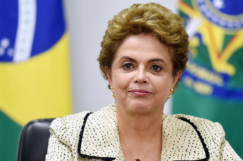  Brazilian President Dilma Rousseff gestures during a meeting with representatives of the National Council of Christian Churches of Brazil (CONIC) at the Planalto Palace in Brasilia, on February 10, 2016. Rousseff met with ministers of the economic area during carnival to discuss the 2016 budget cuts to be announced next February 12.    AFP PHOTO / EVARISTO SA  