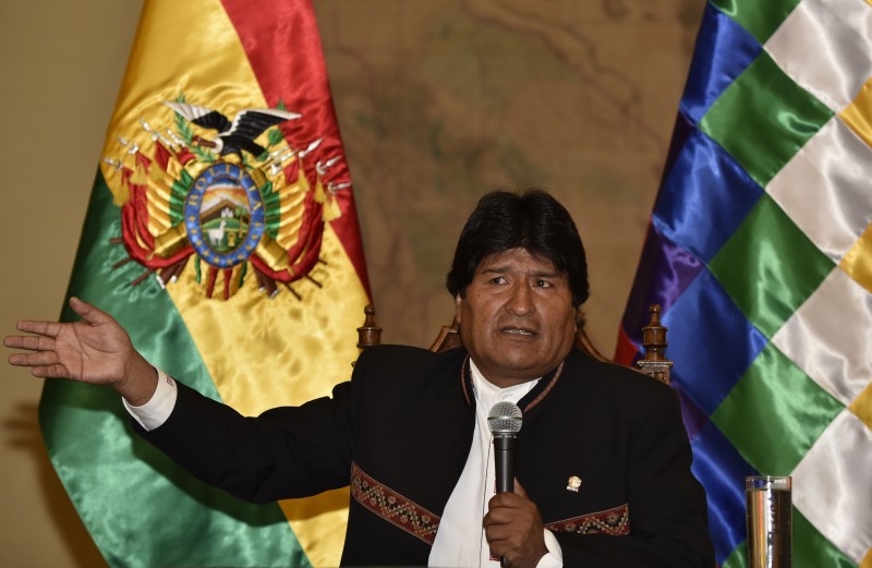  Bolivian President Evo Morales answers questions from the press at Quemado palace in La Paz on February 22, 2016, a day after Bolivians rejected his bid to seek a fourth term and potentially extend his presidency until 2025, according to local media. Early returns Monday indicated Bolivian President Evo Morales was facing defeat in a referendum on seeking a fourth term in power, but he sat tight pending results from his rural strongholds. Morales, Bolivia's first indigenous head of state, promised to respect the official results of Sunday's vote on whether he can run for re-election to extend his time in office to 19 years. AFP PHOTO/Aizar Raldes  