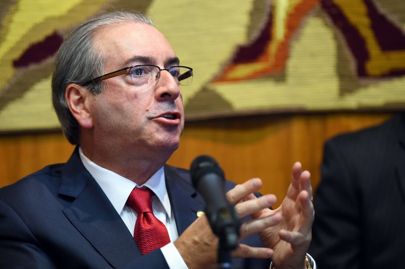  The president of the Brazilian Chamber of Deputies, Eduardo Cunha gestures during a meeting with party leaders at the National Congress in Brasilia on February 16, 2016. The Federal Supreme Court requested today the removal of Cunha as president of the Deputies Chamber. AFP PHOTO/EVARISTO SA  