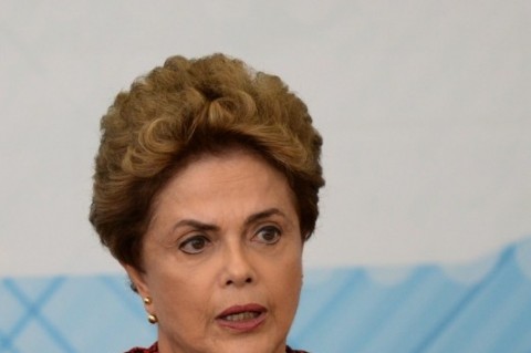  Brazilian President Dilma Rousseff attends the ceremony for the sanction of the legal framework for science, technology and innovation, in Brasilia, on January 11, 2016. Rousseff is under pressure over a badly faltering economy and political instability after impeachment proceedings were launched against her following a billion-dollar corruption scandal.  AFP PHOTO / ANDRESSA ANHOLETE  