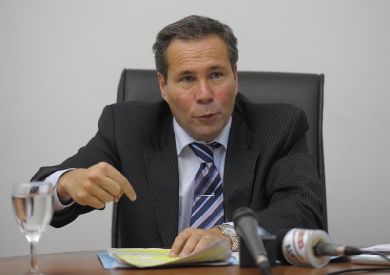  (FILES) ARGENTINA'S PUBLIC PROSECUTOR ALBERTO NISMAN GIVES A NEWS CONFERENCE IN BUENOS AIRES ON MAY 20, 2009. NISMAN, WHO ON JANUARY 14, 2015 ACCUSED PRESIDENT CRISTINA KIRCHNER OF OBSTRUCTING A PROBE INTO A 1994 JEWISH CENTER BOMBING, WAS FOUND SHOT DEAD ON JANUARY 19, 2015, JUST HOURS BEFORE HE WAS DUE TO TESTIFY AT A CONGRESSIONAL HEARING. ALBERTO NISMAN, 51, WAS FOUND DEAD OVERNIGHT IN HIS APARTMENT IN THE TRENDY PUERTO MADERO NEIGHBORHOOD OF THE CAPITAL. "I CAN CONFIRM THAT A .22-CALIBER HANDGUN WAS FOUND BESIDE THE BODY," PROSECUTOR VIVIANA FEIN SAID. "DEATH IS DUE TO GUNSHOT." AFP PHOTO / JUAN MABROMATA  