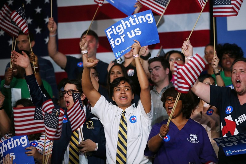  Supporters of Democratic presidential candidate former Secretary of State Hillary Clinton cheer during her Super Tuesday evening gathering at Stage One Ice Studios on March 1, 2016 in Miami, Florida. Early Super Tuesday results show Hillary Clinton has won primaries in Tennessee, Alabama, Virginia and Georgia.   Justin Sullivan/Getty Images/AFP  