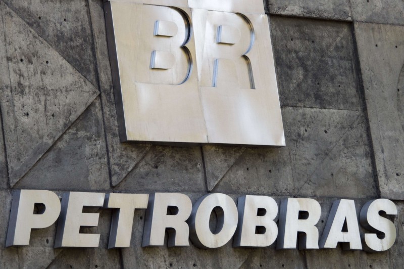  (FILES) VIEW OF THE PETROBRAS LOGO ON ITS HEADQUARTERS IN RIO DE JANEIRO, BRAZIL ON DECEMBER 12, 2014. TWO DAYS AFTER BRAZIL'S SUPREME COURT AUTHORIZED TO INVESTIGATE 12 SENATORS AND 22 DEPUTIES PRESUMABLY LINKED TO THE PETROBRAS CORRUPTION NETWORK, PRESIDENT DILMA ROUSSEFF DEFENDED A 