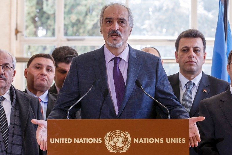  Syrian chief negotiator Bashar al-Jaafari, ambassador of the Permanent Representative Mission of the Syria to UN New York, briefs the media after a round of negotiations between the Syrian government and UN Special Envoy of the Secretary-General for Syria Staffan de Mistura (no pictured), at the European headquarters of the United Nations in Geneva, on March 14, 2016.  / AFP PHOTO / POOL / SALVATORE DI NOLFI  