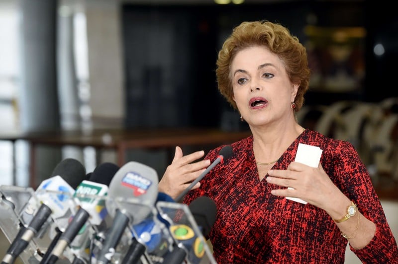  Brazilian President Dilma Rousseff speaks during a press conference at Planalto Palace in Brasilia on March 16, 2016.  Rousseff named her predecessor Luiz Inacio Lula da Silva as her chief of staff Wednesday, sparing him possible arrest for corruption as she seeks to fend off a damaging crisis. AFP PHOTO/EVARISTO SA  