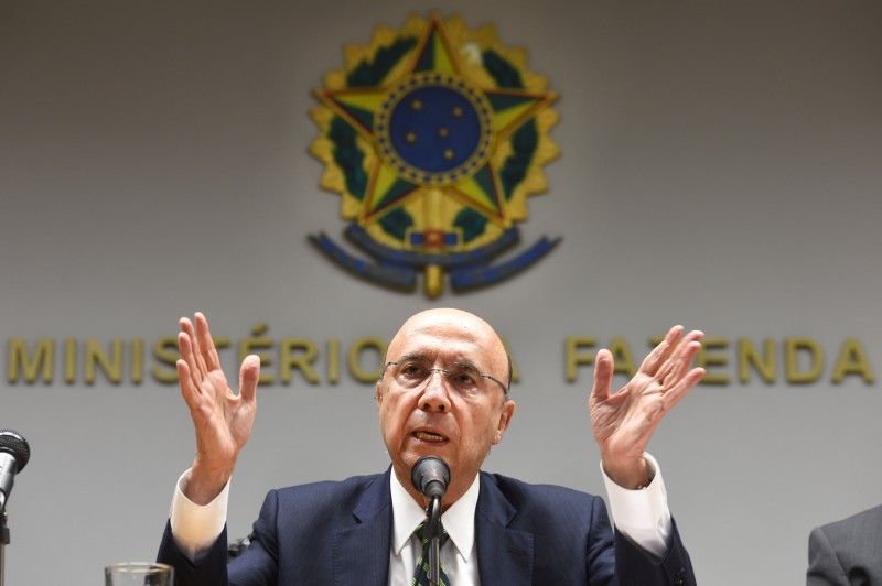  New Brazilian Finance Minister Henrique Meirelles speaks during a press conference to announce the names of the new members of the government's economic team in Brasilia on May 17, 2016.   Meirelles named Ilan Goldfajn for the Central Bank, Marcelo Caetano for the Department of Welfare, Mansueto Almeida Junior as Secretary of Economic Monitoring and Carlos Hamilton as Secretary of Economic Policy. / AFP PHOTO / EVARISTO SA  