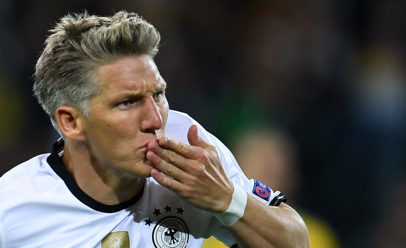 Schweinsteiger comemora o seu gol, o segundo da vitória da Alemanha