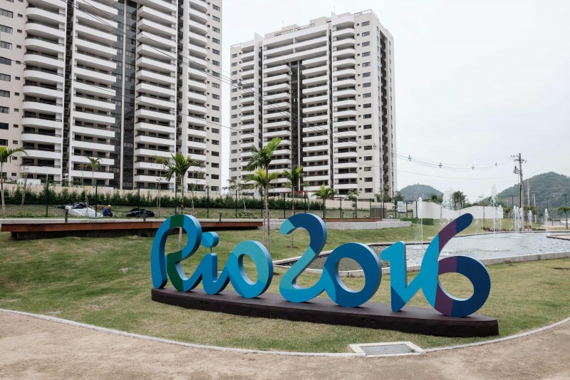  A logo of Rio 2016 is seen at the Olympic and Paralympic Village in Rio de Janeiro, Brazil, on June 23, 2016. / AFP PHOTO / YASUYOSHI CHIBA  