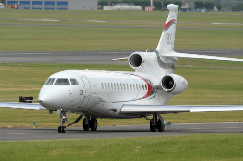  A DASSAULT FALCON 8X MOVES ON JUNE 12, 2015 DURING THE FLIGHT DISPLAY PREPARATIONS THREE DAYS PRIOR TO THE OPENING OF THE INTERNATIONAL PARIS AIRSHOW AT LE BOURGET. AIRBUS SAID ON JUNE 10 ITS A400M WOULD TAKE PART IN THE FLYING DISPLAY AT THE PARIS AIRSHOW NEXT WEEK, JUST OVER A MONTH AFTER ONE OF THE PLANES FATALLY CRASHED IN SPAIN AFTER A MASSIVE ENGINE FAILURE. AFP PHOTO / ERIC PIERMONT  