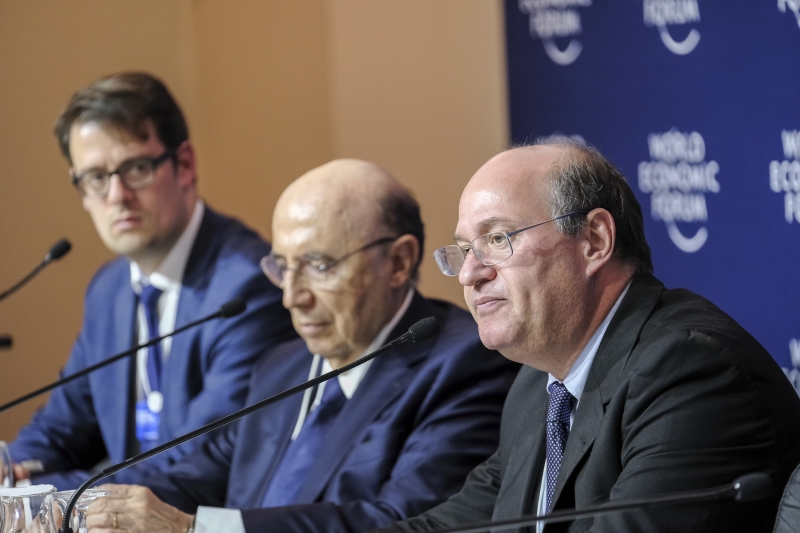 Henrique Meirelles, Minister of Finance of Brazil and Ilan Goldfajn, Governor of the Central Bank of Brazil and Georg Schmitt, Media Lead, Corporate Affairs and Foundations, World Economic Forum speaking at the Annual Meeting 2017 of the World Economic Forum in Davos, January 18, 2017..Copyright by World Economic Forum / Walter Duerst