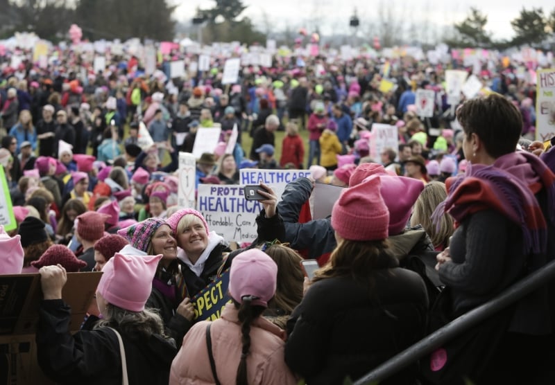 Marcha foi apoiada por atos em centenas de cidades norte-americanas e em todo o mundo