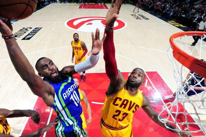 ATLANTA, GA - MARCH 3: Tim Hardaway Jr. #10 of the Atlanta Hawks shoots a lay up during the game against LeBron James #23 of the Cleveland Cavaliers on March 3, 2017 at Philips Arena in Atlanta, Georgia. NOTE TO USER: User expressly acknowledges and agrees that, by downloading and/or using this Photograph, user is consenting to the terms and conditions of the Getty Images License Agreement. Mandatory Copyright Notice: Copyright 2017 NBAE   Scott Cunningham/NBAE via Getty Images/AFP
      Caption