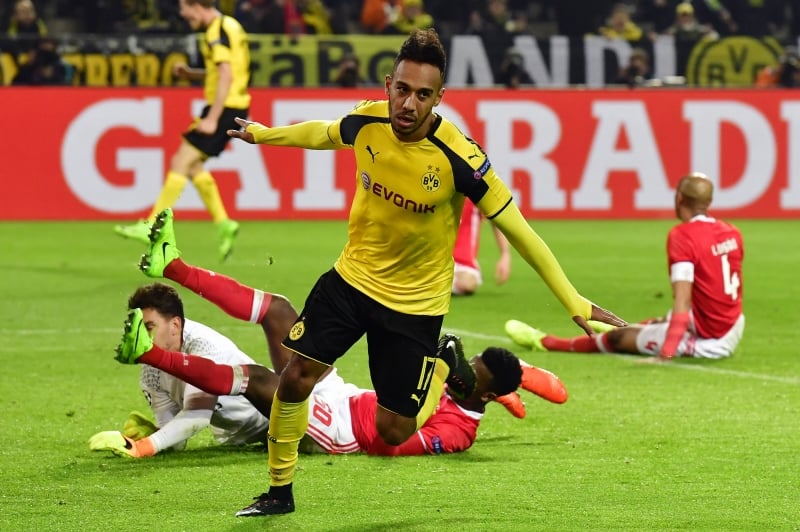 Dortmund's Gabonese forward Pierre-Emerick Aubameyang celebrate scoring a hattrick, the 4-0 goal during the UEFA Champions League Round of 16, 2nd-leg football match Borussia Dortmund v SL Benfica in Dortmund, western Germany on March 8, 2017 / AFP PHOTO / John MACDOUGALL
