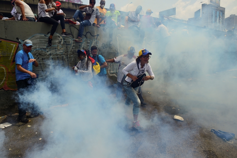 Confrontos violentos foram registrados durante os atos em Caracas