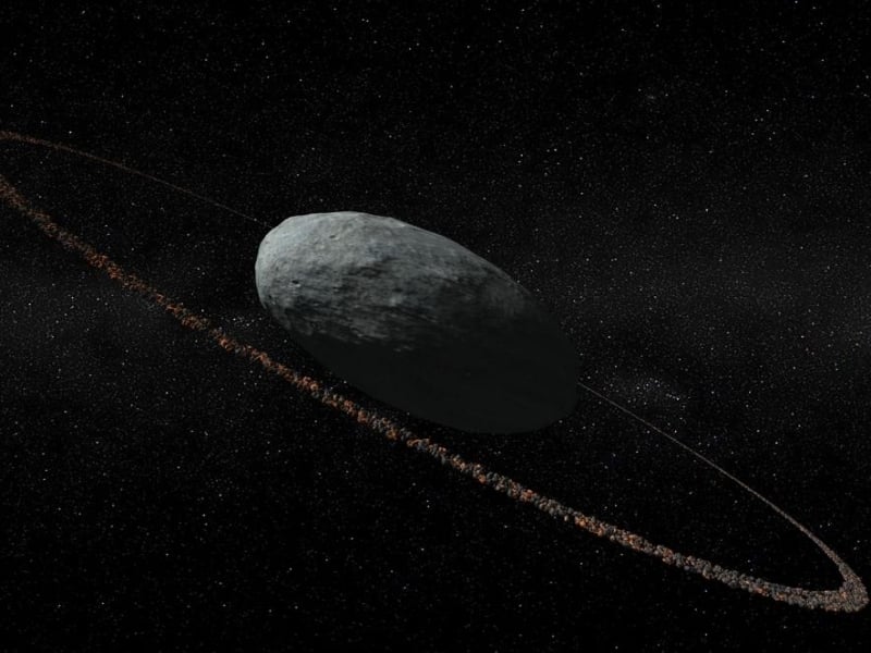 Concepção artística do anel de Haumea