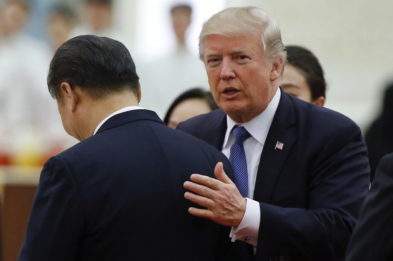 O presidente dos Estados Unidos elogiou Xi, durante a aparição ao lado do líder chinês