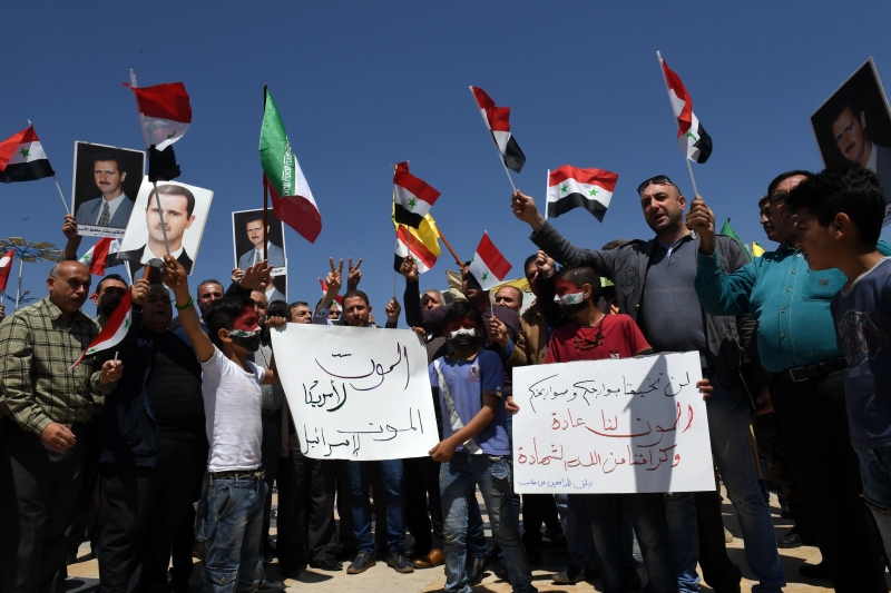 Apoiadores do presidente em Aleppo fizeram protestos em apoio a Assad  