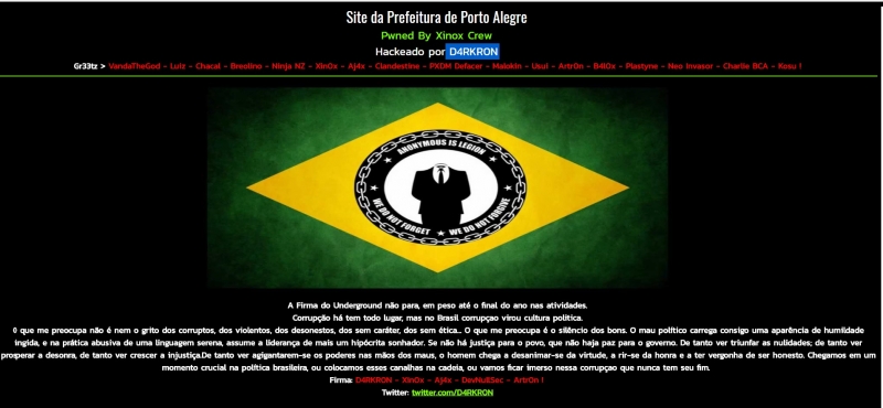 Página exibe uma bandeira do Brasil com emblema hacker e mensagens de protesto contra a corrupção
