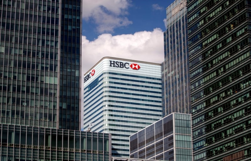 ECO HSBC 060147-01-02
(FILES) In this file photo taken on July 31, 2018, the HSBC UK headquarters is seen at the Canary Wharf financial district of London on July 31, 2018. - HSBC has agreed to pay $765 million to resolve allegations it passed on toxic mortgage securities to investors prior to the global financial crisis, federal prosecutors announced October 9, 2018. Between 2005 and 2007, HSBC staff knowingly packaged low-grade loan pools with high rates of default into mortgage-backed securities, despite warnings from its internal risk management team and outside reviewers, according to the US Attorney's Office in Colorado. (Photo by Tolga Akmen / AFP)