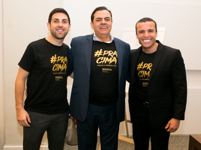 Eduardo Bitello, Marcos Tolentino e Michael Soares no evento do Grupo Marca
