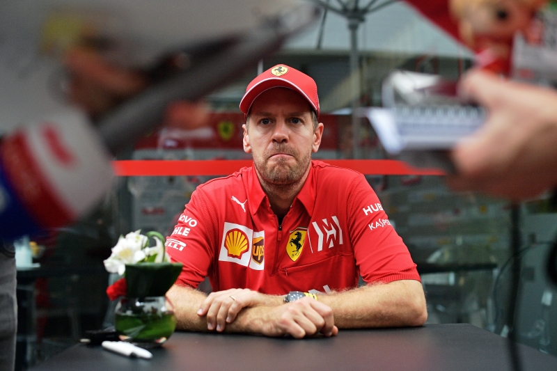 Ferrari's German driver, Sebastian Vettel at the Interlagos racetrack in Sao Paulo, Brazil on November 14, 2019, ahead of the upcoming Formula One Brazilian Grand Prix on November 17. (Photo by CARL DE SOUZA / AFP)
      Caption