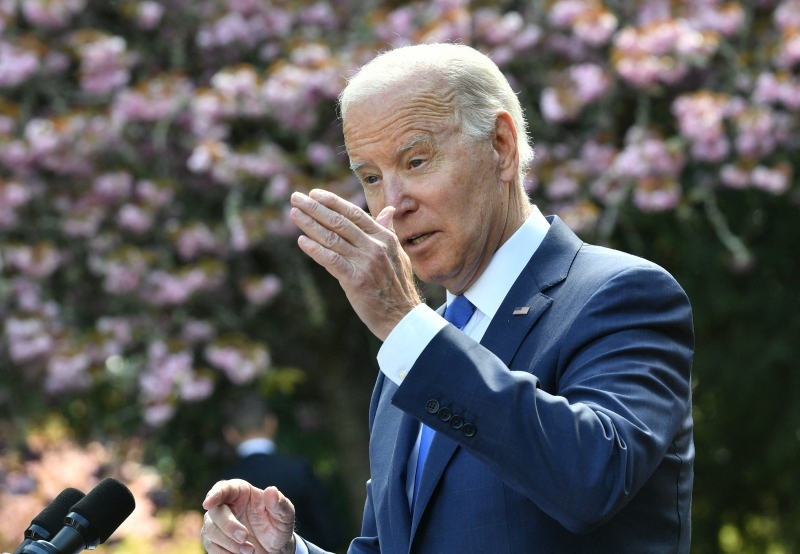 US President Joe Biden speaks on Earth Day at Seward Park in Seattle, Washington, on April 22, 2022. - Biden was marking Earth Day on Friday by ordering protections for the United States' ancient forests, seen as a crucial weapon in the fight against climate change, during a trip to Seattle. (Photo by MANDEL NGAN / AFP)
      Caption