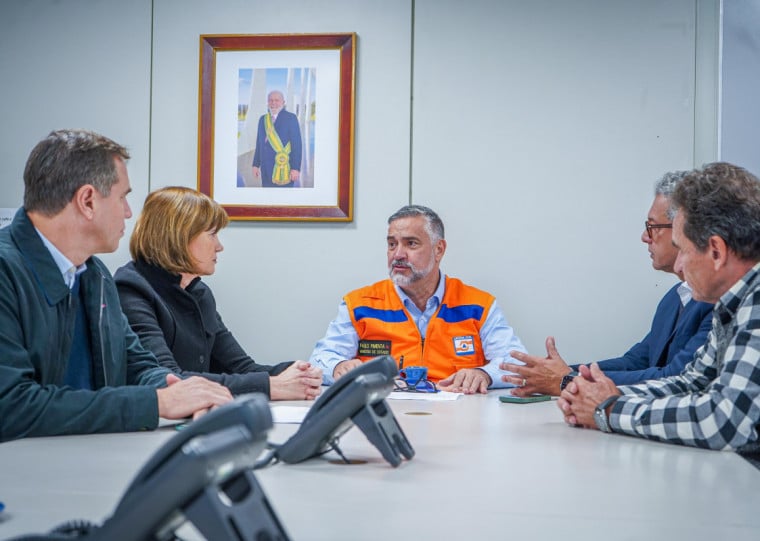 CEO da Fraport (esq.) apresentou estimativa em reunião com ministro Paulo Pimenta (centro)