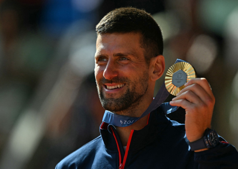  Djokovic completou a prateleira de troféus com a conquista neste domingo (4) do ouro olímpico
