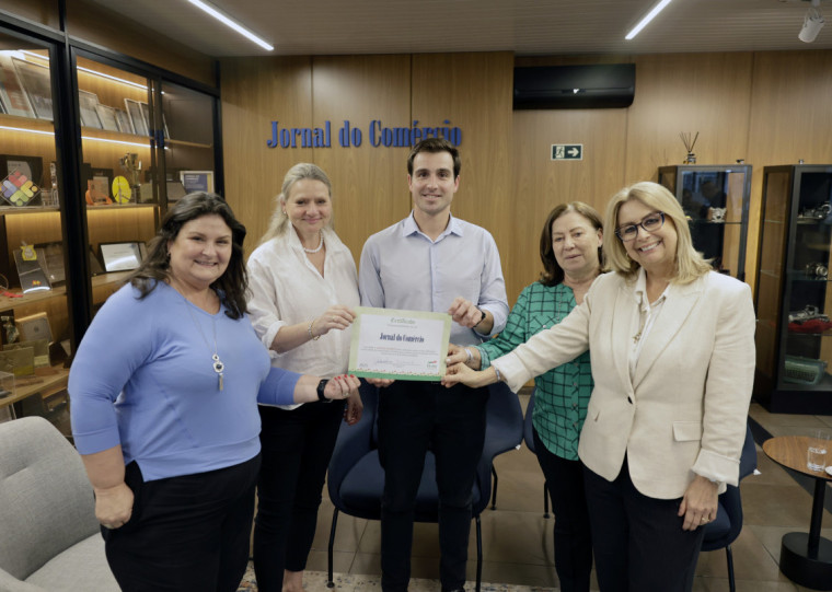 Diretoria da Kinder foi recebida no Jornal do Comércio pelo diretor-presidente, Giovanni Jarros Tumelero