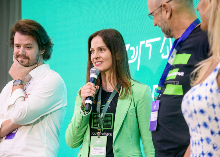 Caroline no anúncio do Investimento, em São Paulo, em evento do Sebrae