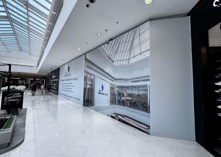 Tapume mostra espaço que será compartilhado entre as duas marcas