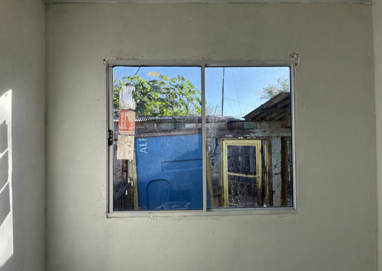 Bairro ainda luta para se reerguer depois das cheias do ano passado, quando a água chegou a dois metros de altura