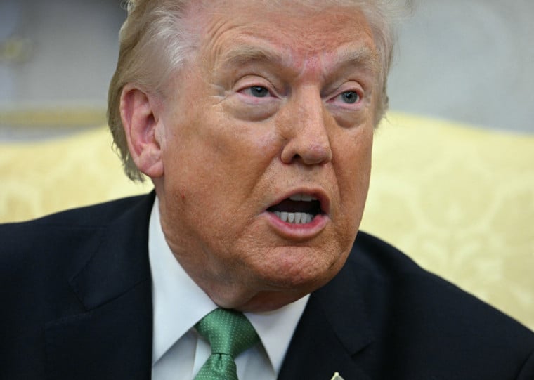  US President Donald Trump speaks to the pressas he holds a bilateral meeting with Irish Prime Minster Micheal Martin in the Oval Office of the White House in Washington, DC, on March 17, 2026. The Irish prime minister arrived in the United States March 13 for an annual St Patrick's Day trip under pressure to talk tough to US President Donald Trump amid the Iran war. (Photo by Jim WATSON / AFP)