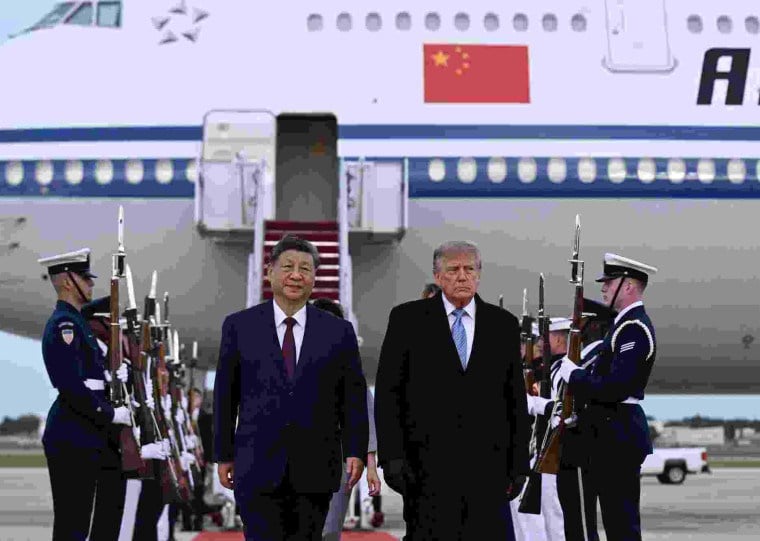 Presidente norte-americano recebeu Xi na base militar onde pousou o presidente chinês