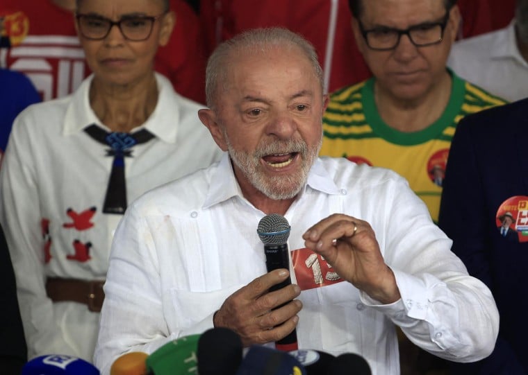  Brazil's President and re-election candidate for the Workers' Party (PT) Luiz Inacio Lula da Silva speaks after casting his vote during the presidential runoff election, at a polling station in Sao Bernardo do Campo, state of Sao Paulo, Brazil, on October 25, 2026. Lula da Silva faces right-wing senator Flavio Bolsonaro in a runoff that will determine whether Brazil remains one of the few leftist nations in the region or joins a regional swing to the right championed by US President Donald Trump, Bolsonaro's ally. (Photo by Miguel SCHINCARIOL / AFP)